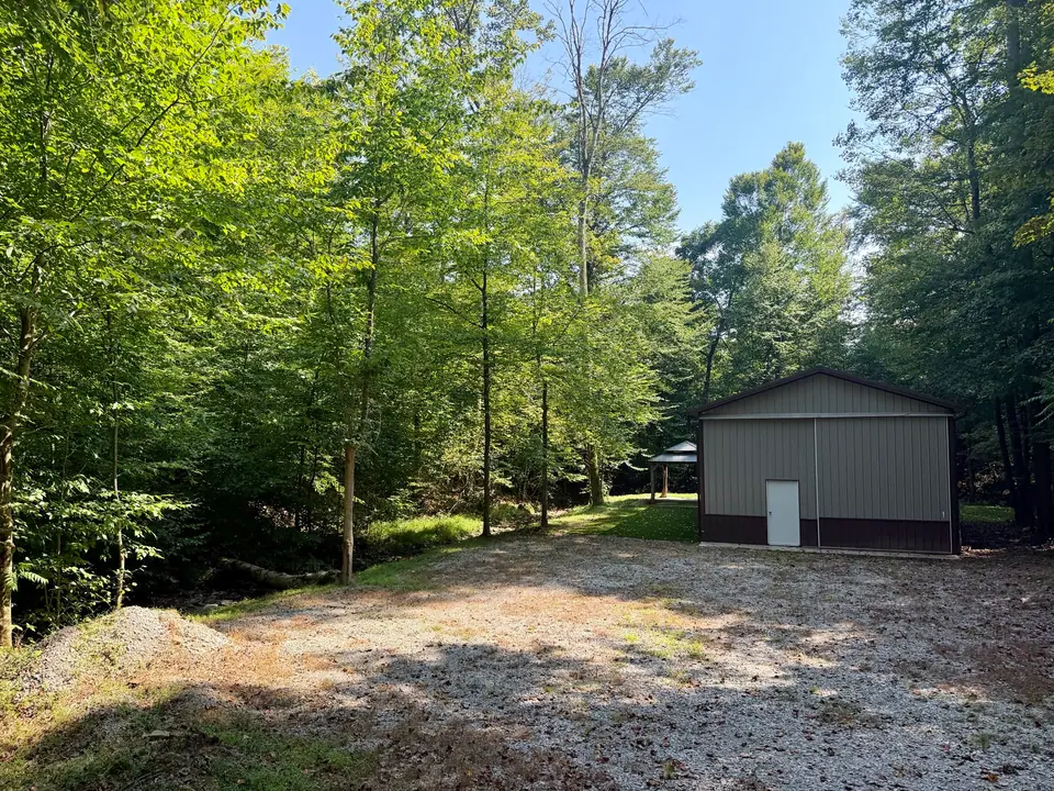 Pole barn and gazebo along the creek at 1845 Whitewater Parkway